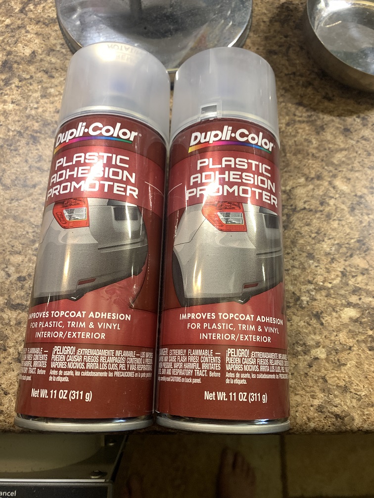 Clear primer to help paint adhesion to plastic