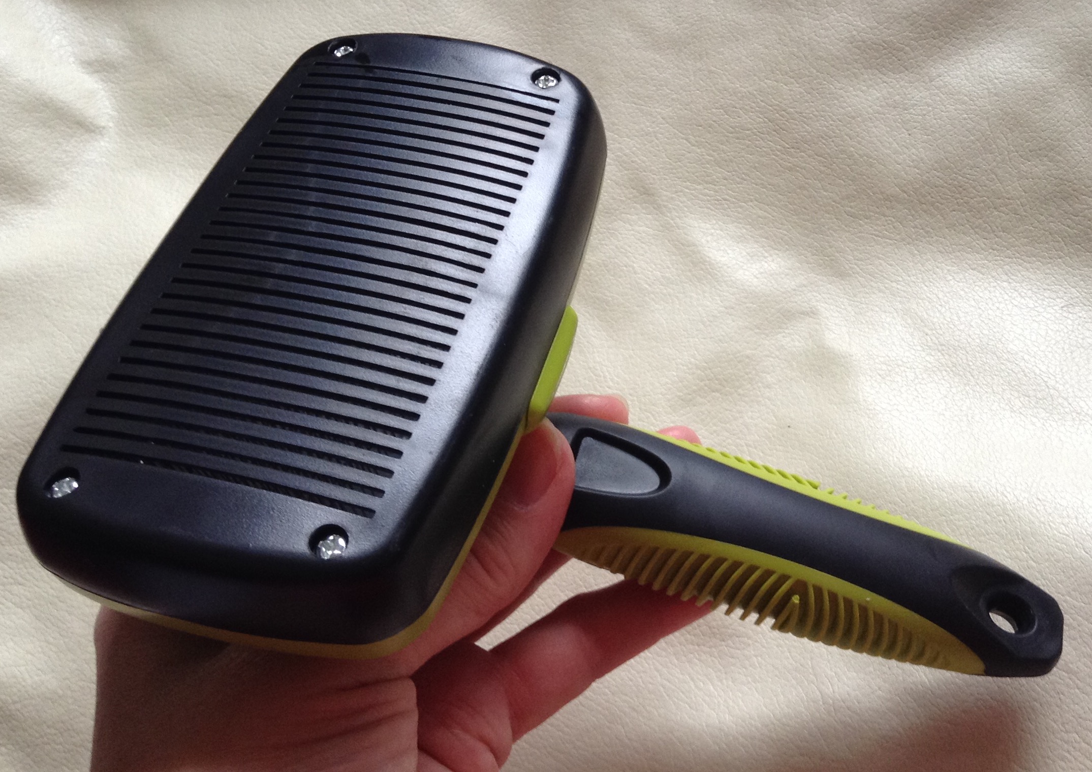 A Retractable Dog Grooming Brush that Does What it Says on the Tin