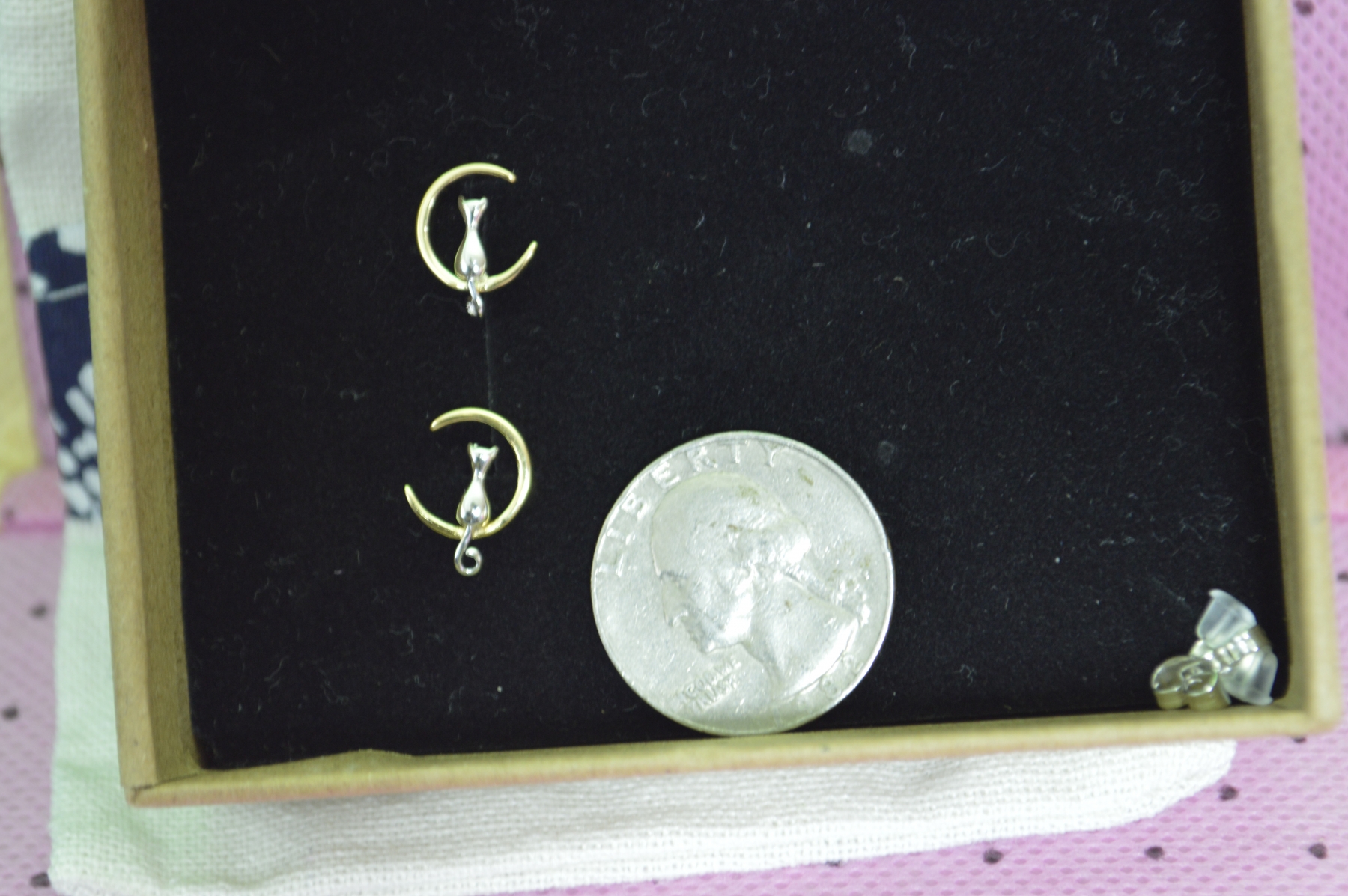 Calling all Moonie Fans.  The cutest and dainty little moon kitty earrings ever.