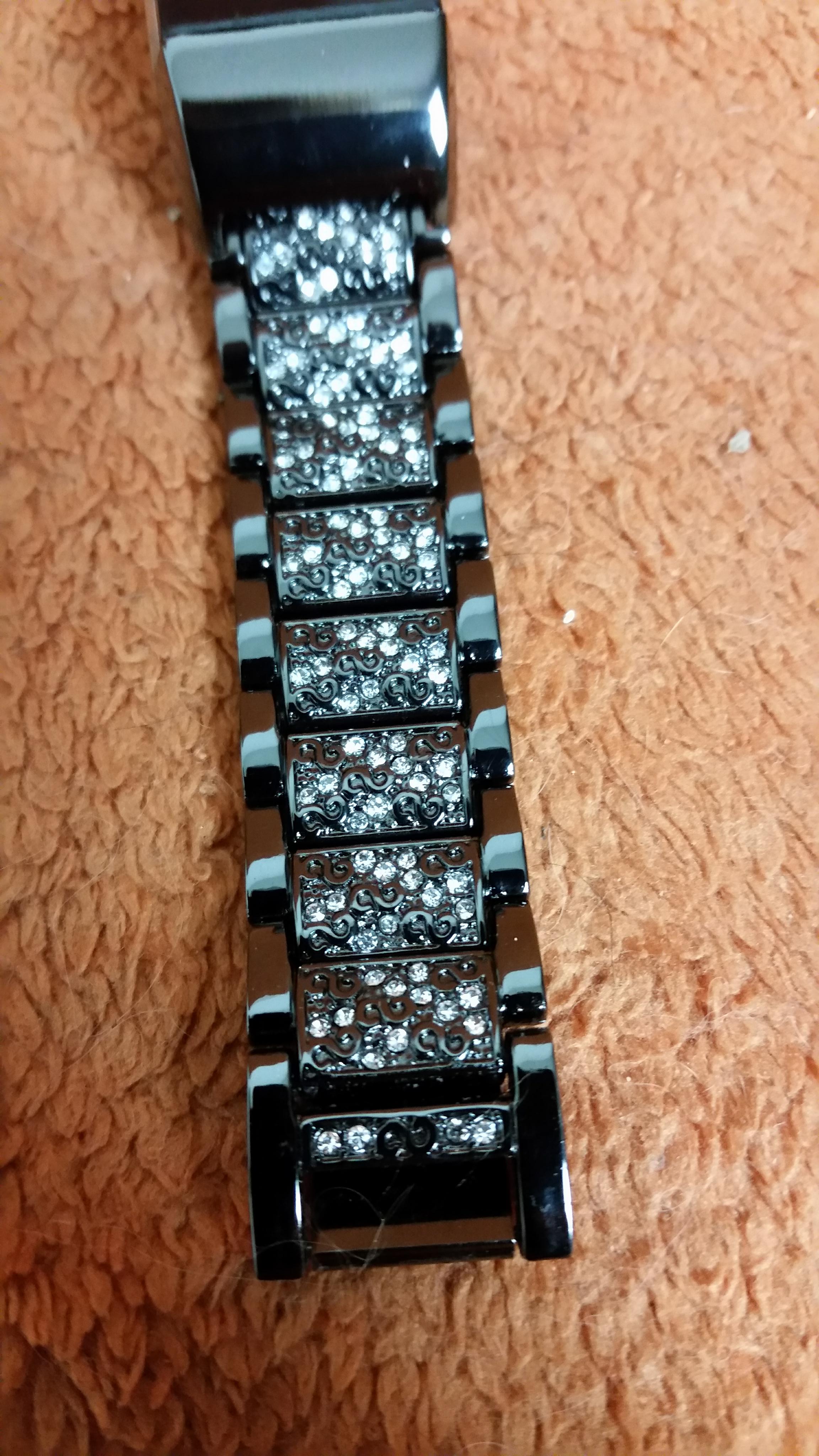 Shine on crazy diamond, beautiful band has stones that sparkle in the sun, very classy looking & unique, high quality, comfy, & adjustable.