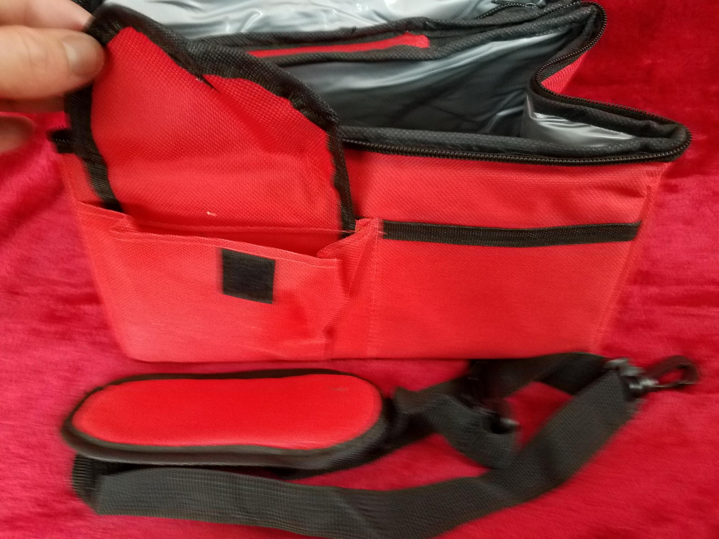 Luxurious, lovely, vibrant red lunch bag is well insulated, waterproof, very high quality, portable, has padded handle AND a long shoulder strap, perfect for all occasions!