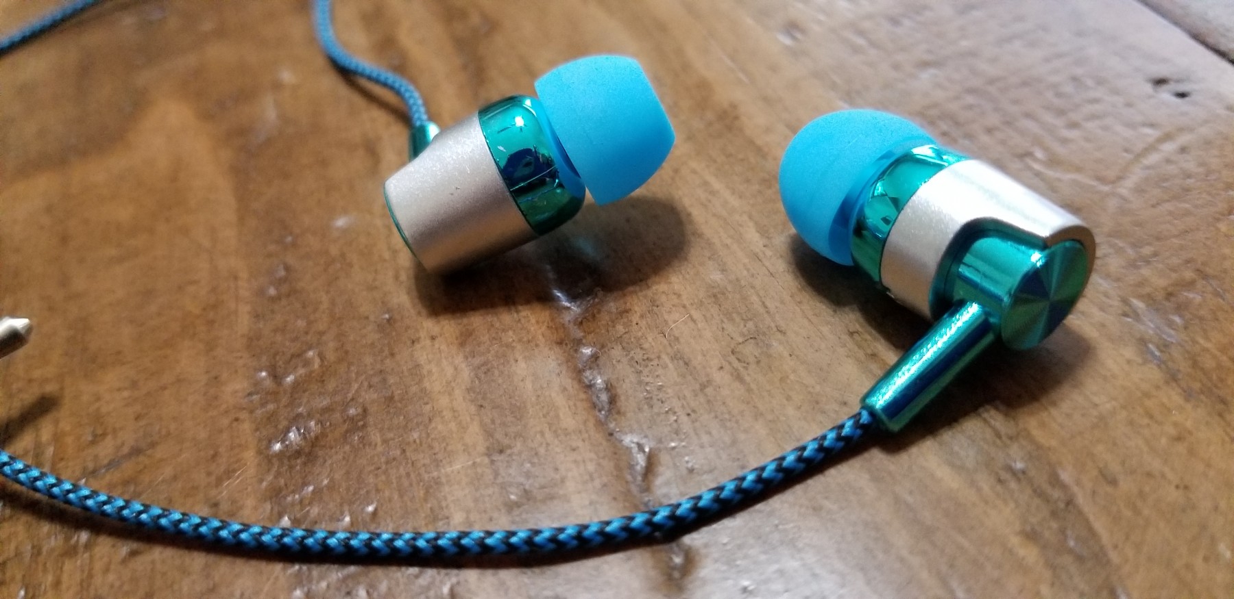 Beautiful shade of blue earbuds