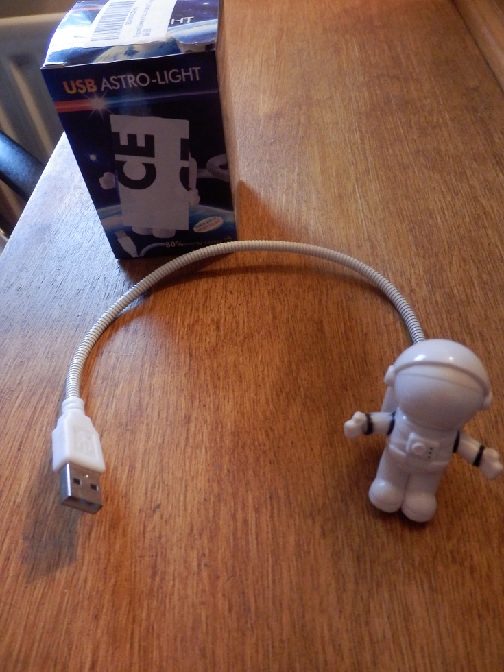 An original USB LED light in the shape of an astronaut, gives enough light to work in the dark