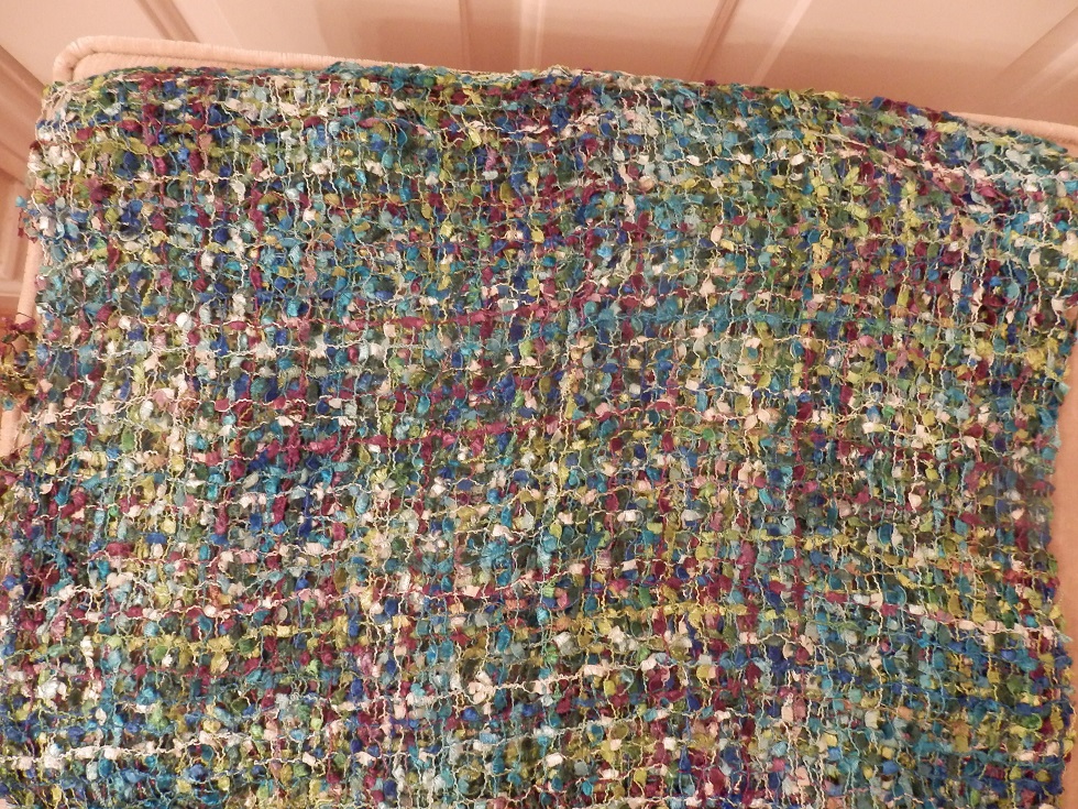 A net weave scarf bursting with colours by Cool Trade Winds