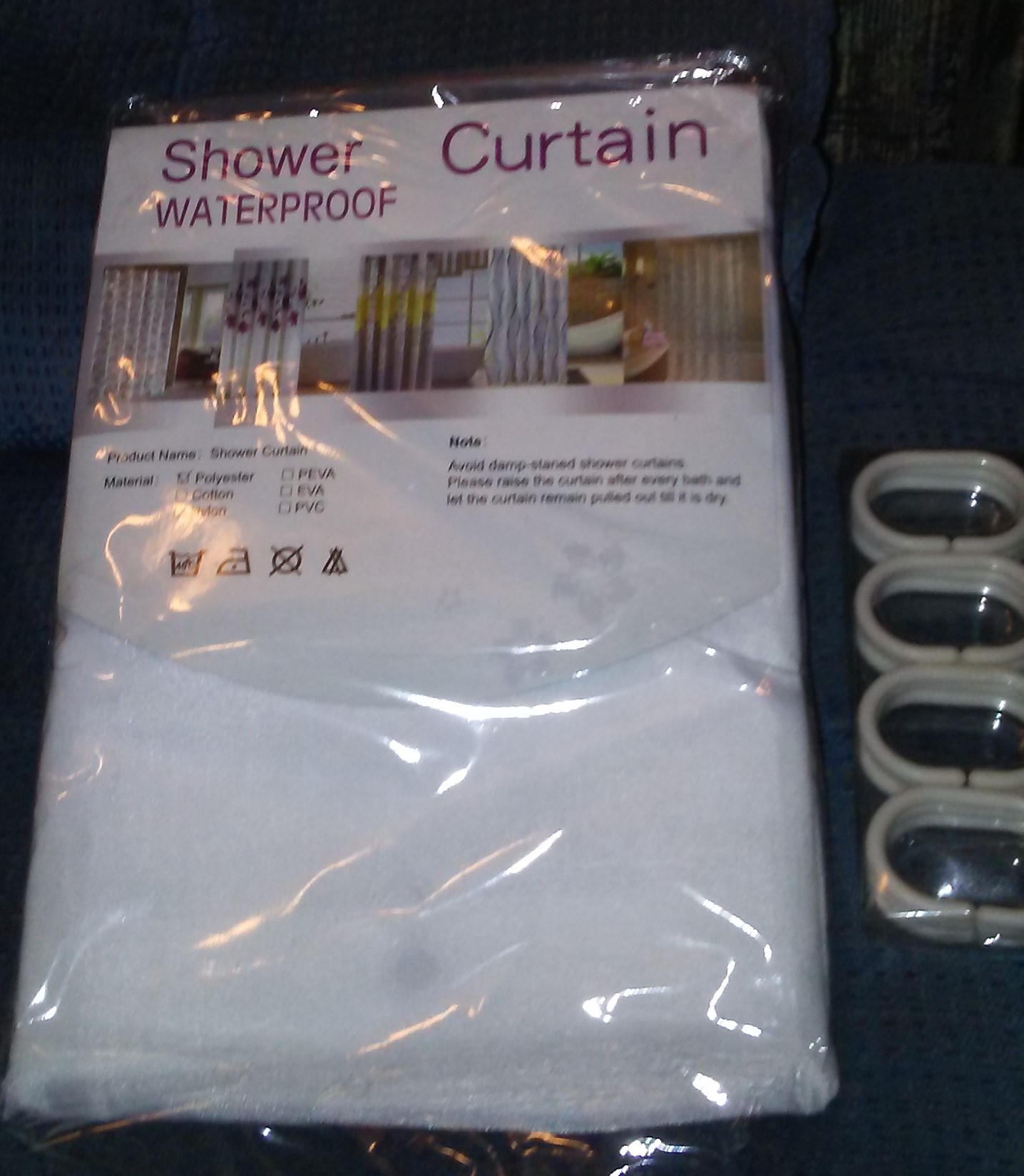 Very nice shower curtain. Waterproof, mildew resistant, hardware included