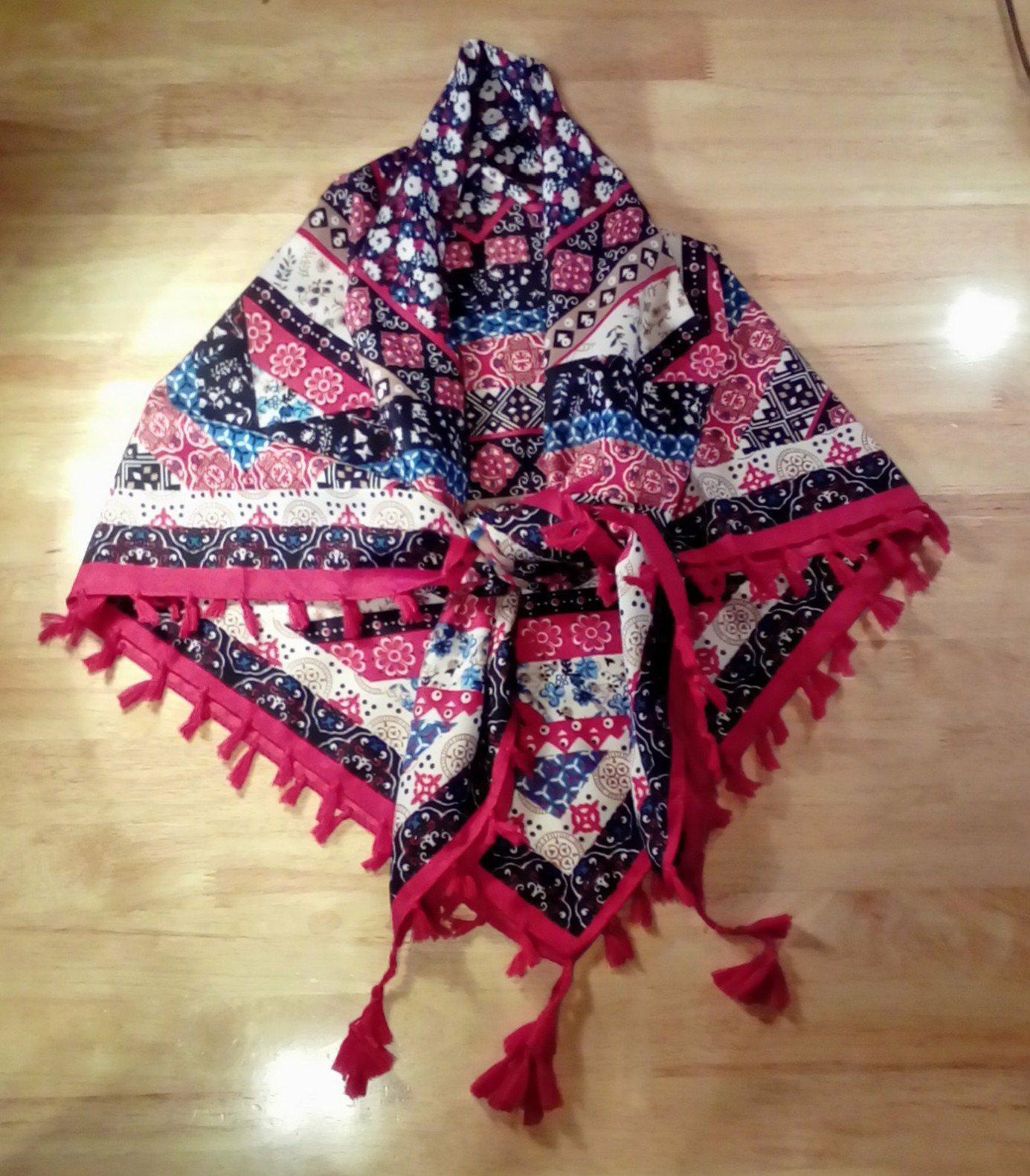 Love the style, pattern and colors of this scarf!