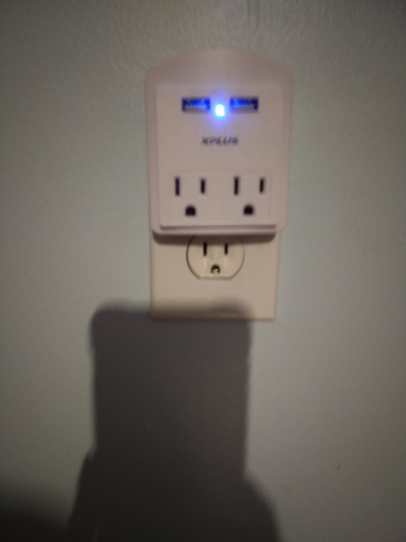 The XPLUS USB Wall Outlet has 2 USB charging ports and 2 AC Outlet Plugs